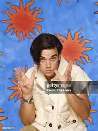 The Unforgettable Journey of Robbie Williams