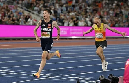 Jakob Ingebrigtsen crosses the finish line to win gold.