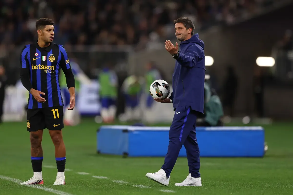 PERTH, AUSTRALIA - AUGUST 08: Cristian Chivu head coach of FC Internazionale looks on with Andy Diouf during the match between Juventus and FC Internazionale at Optus Stadium on August 08, 2026 in Perth, Australia. (Photo by Janelle St Pierre/Getty Images)